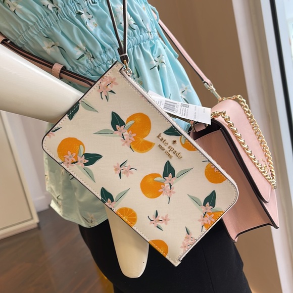 Kate Spade Lucy Orange Toss Printed Medium L-Zip Wristlet
Cream Multi
NWT - Picture 10 of 16